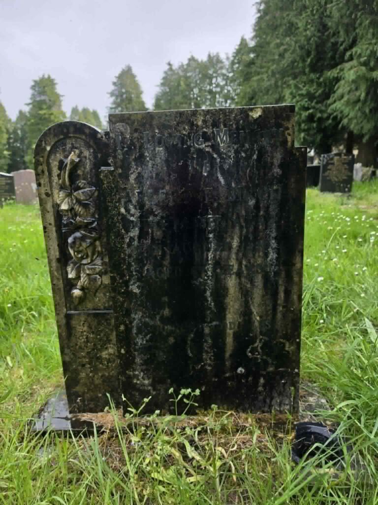 Memorial statue after grave cleaning